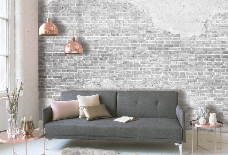             Backsteinmauer mit angesagten Industrial Look – Grau
        