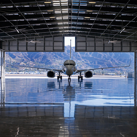         Flugzeughalle – Fototapete 3D Optik Flugzeughangar
    