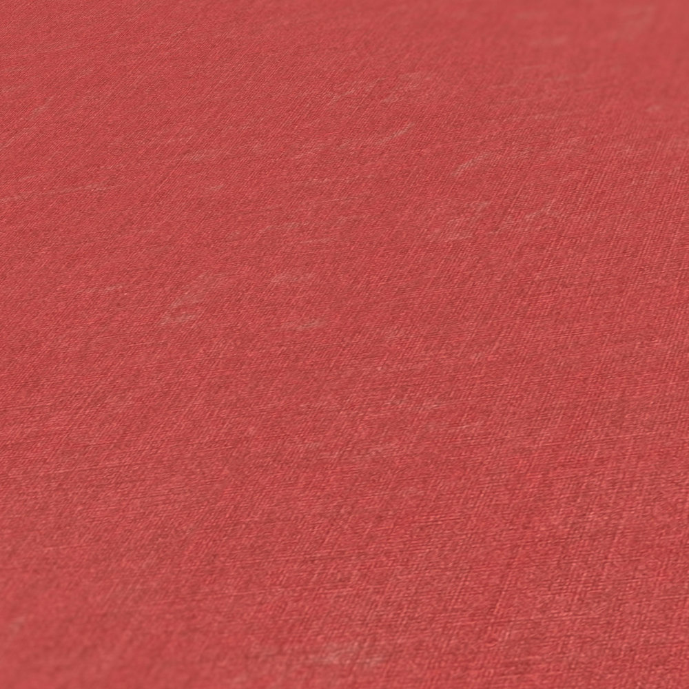             Rote Tapete einfarbig und meliert mit Strukturprägung
        