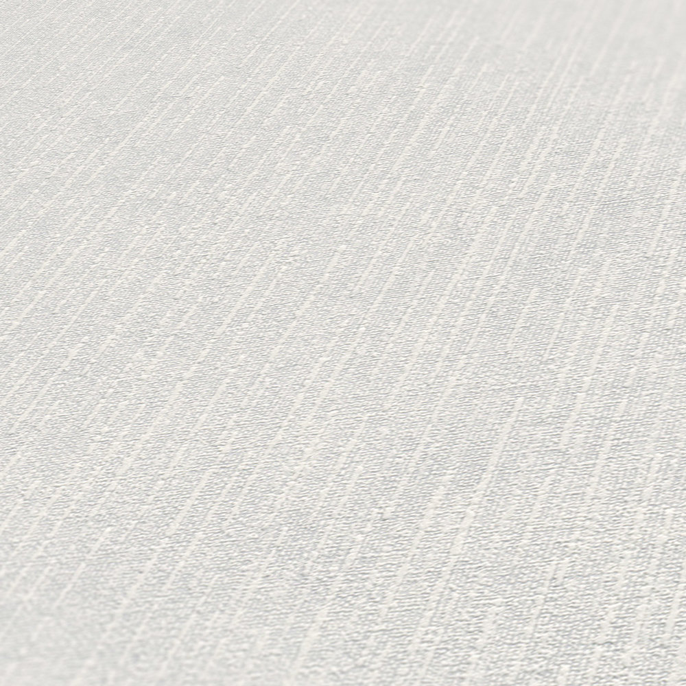             Weiße Tapete uni mit natürlicher Oberflächenstruktur
        