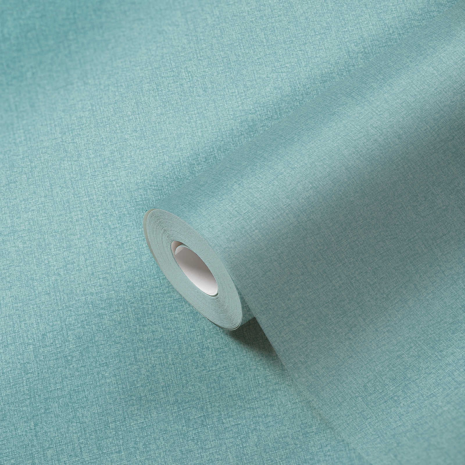             Einfarbige Vliestapete in Gewebe-Optik mit leichter Struktur, matt – Türkis, Blau, Hellblau
        