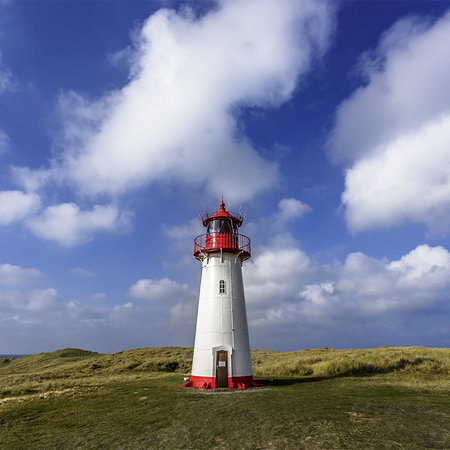 Fototapete Leuchtturm – Malerische Küstenlandschaft
