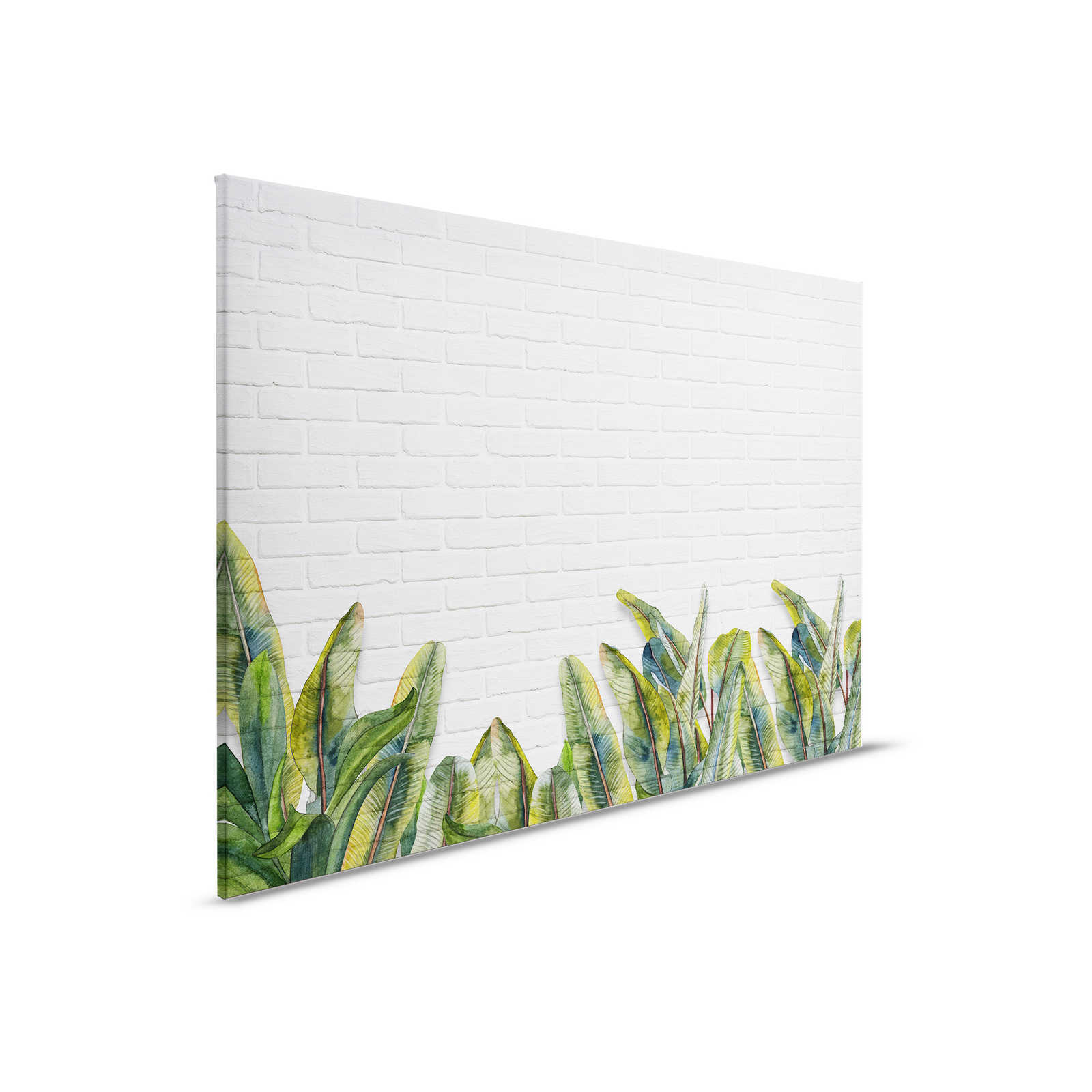 Leinwandbild mit Blättern vor weißer Backsteinmauer – 0,90 m x 0,60 m
