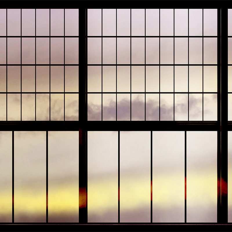 Sky 2 - Fototapete Fenster Ausblick Sonnenaufgang – Gelb, Schwarz | Struktur Vlies
