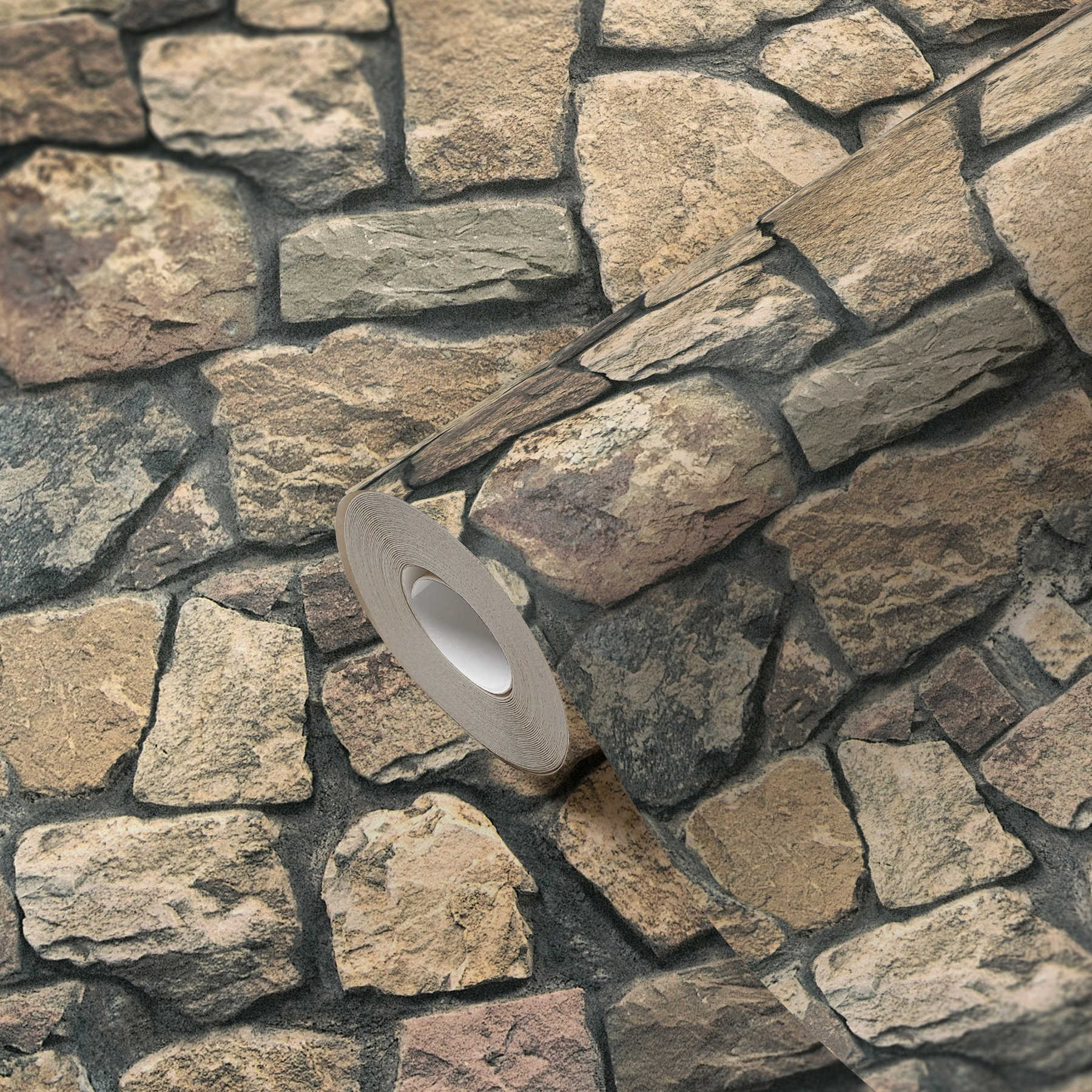             Vliestapete Maueroptik mit 3D Natursteinen – Bunt
        