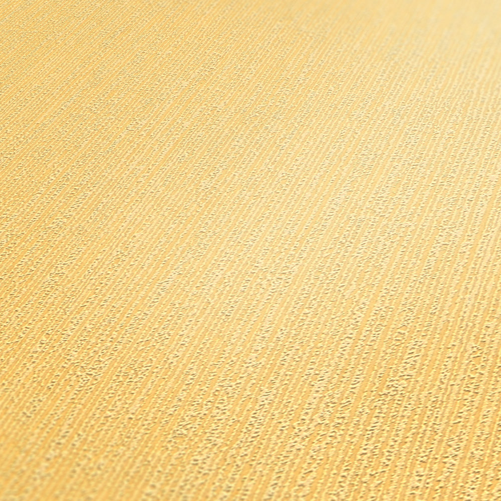             Vliestapete Gelb uni mit natürlichem Strukturmuster
        