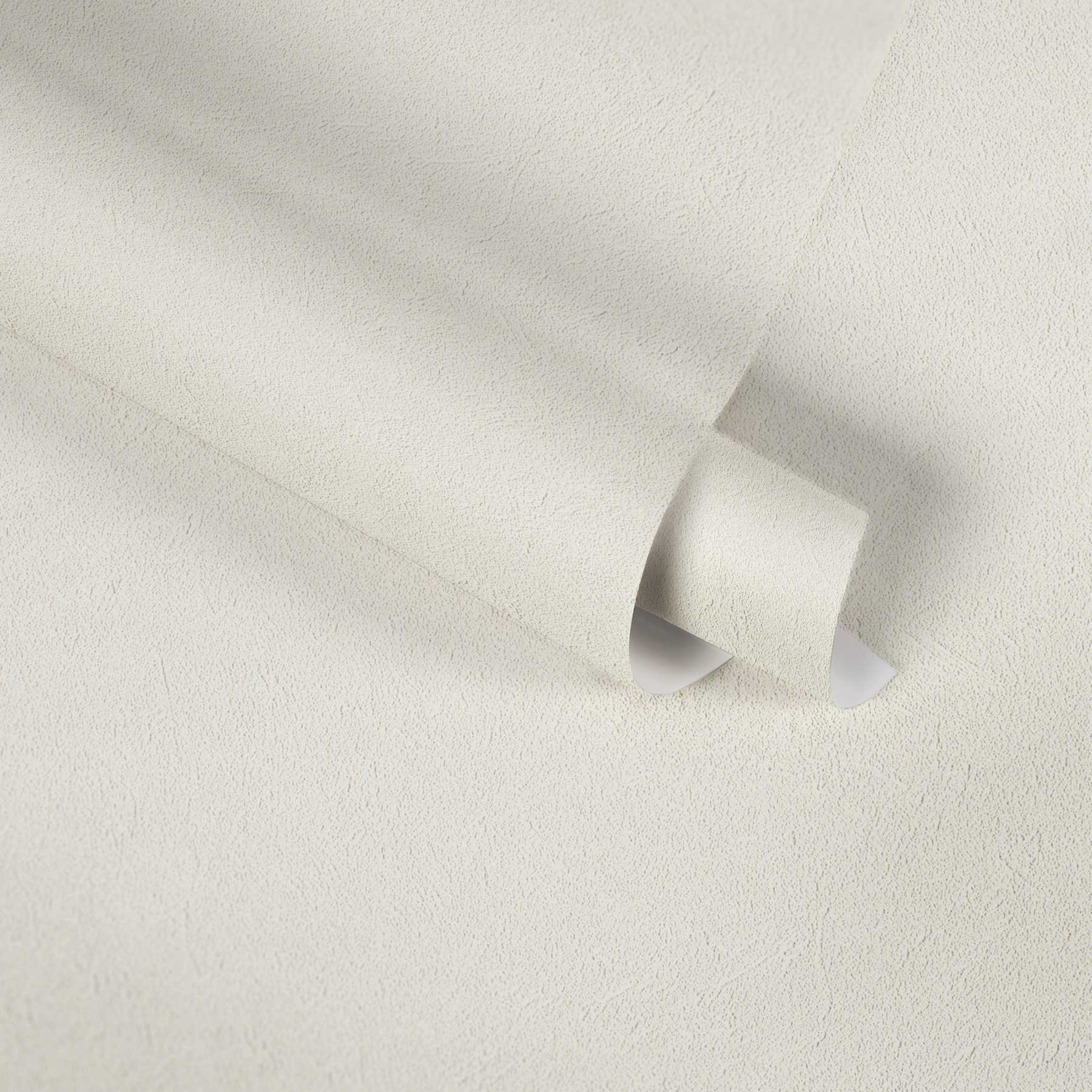             Einfarbige Tapete Creme-Weiß mit dezentem Strukturdesign
        