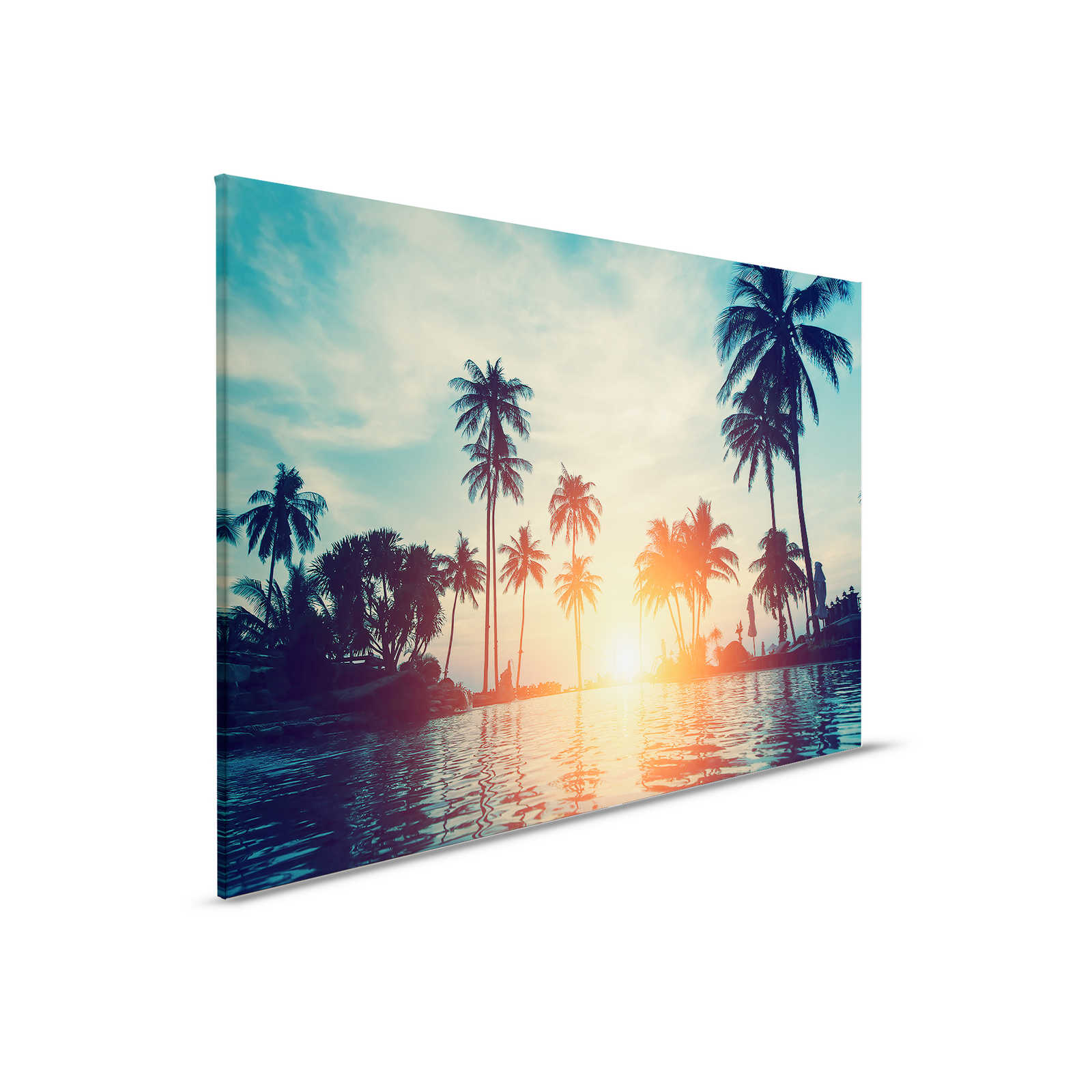         Leinwandbild mit Palmen am Wasser im Sonnenuntergang – 0,90 m x 0,60 m
    