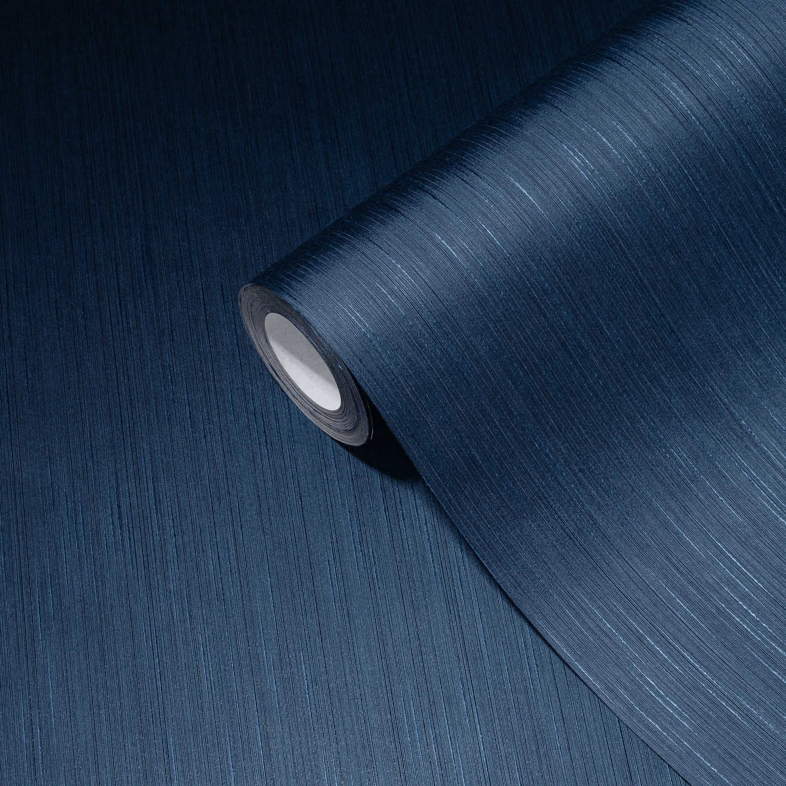             Uni Vliestapete mit liniertem Strukturmuster – Blau
        