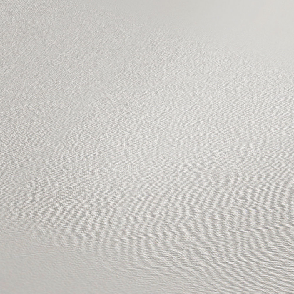             Vliestapete Creme-Weiß mit natürlicher Textiloptik
        