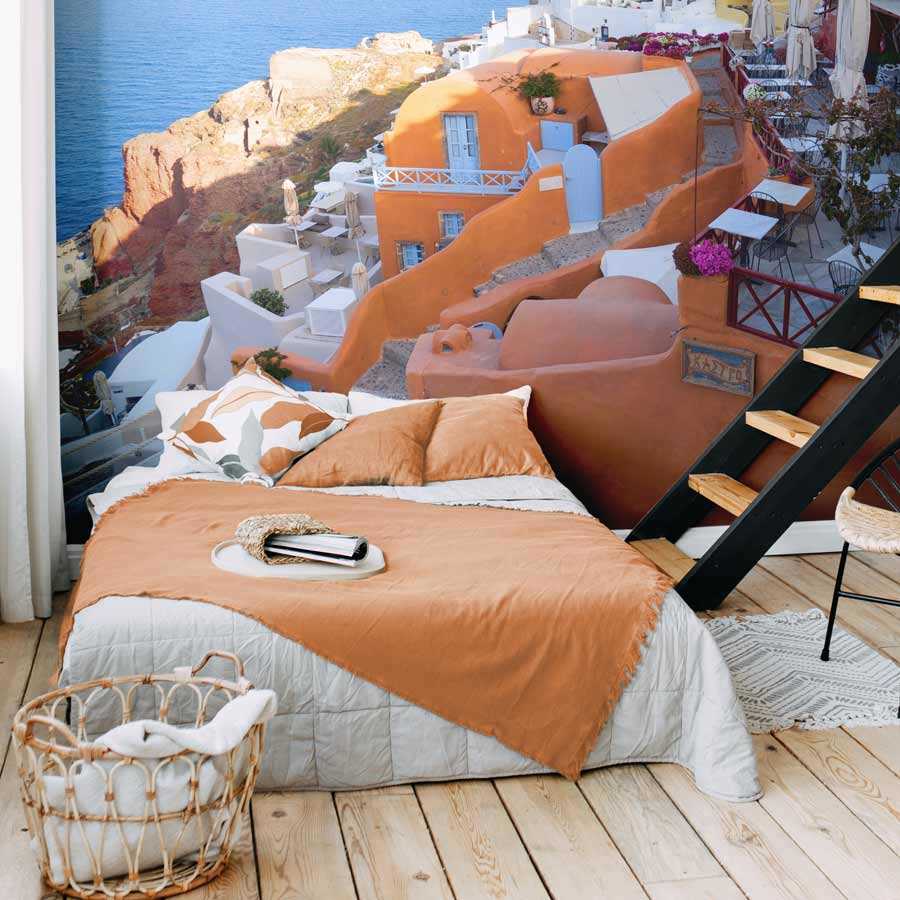 Fototapete Terrasse an der Küste Santorinis – Perlmutt Glattvlies
