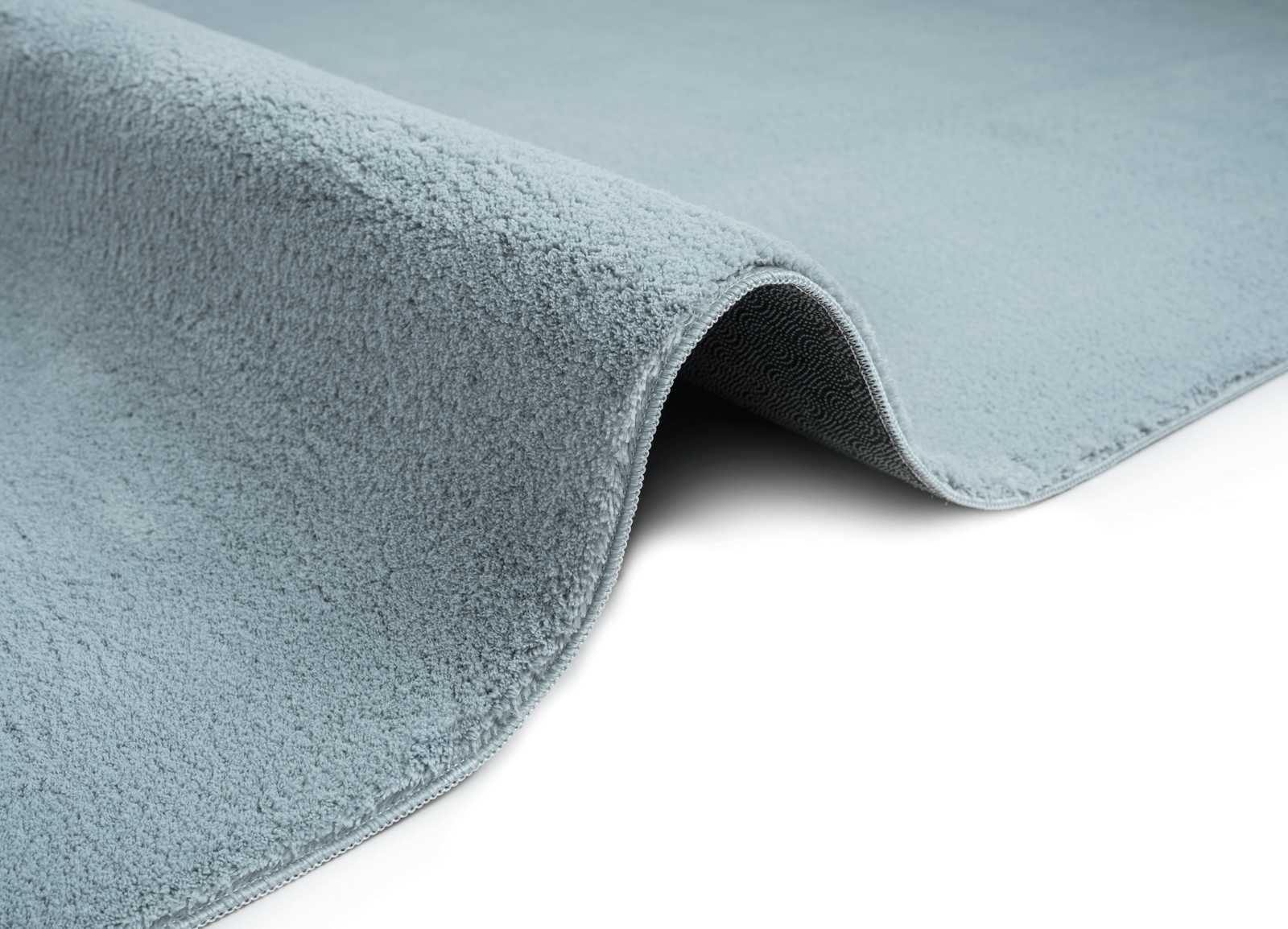             Flauschiger Hochflor Teppich in Blau – 110 x 60 cm
        