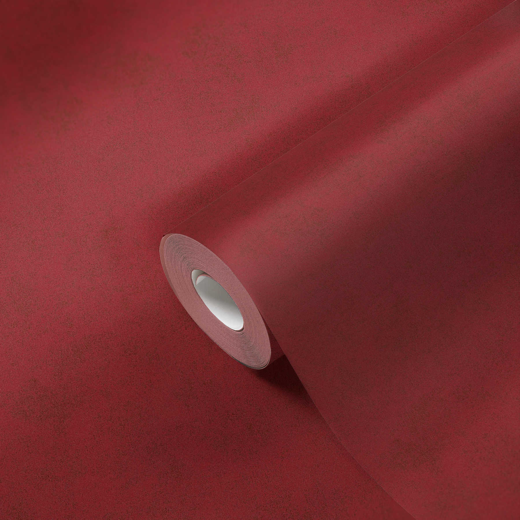             Unifarbene Vliestapete mit melierter Struktur – Rot
        