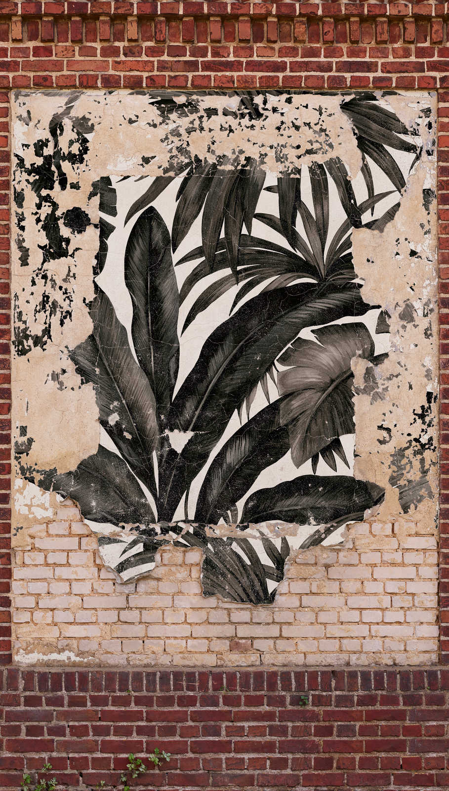             Ziegelsteinwand Tapete mit Palmenblättern im Used Look – Braun, Beige, Rot
        
