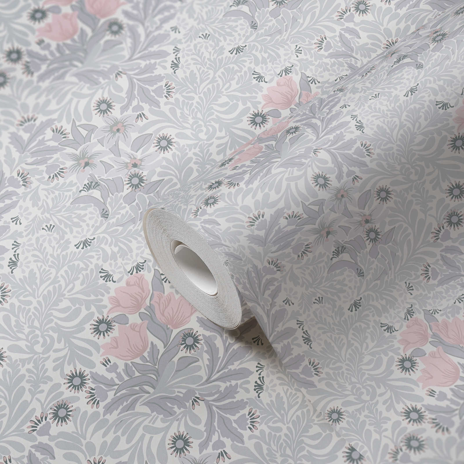             Vliestapete mit floralem Muster in sanften Farbtönen – Grau, Rosa, Weiß
        