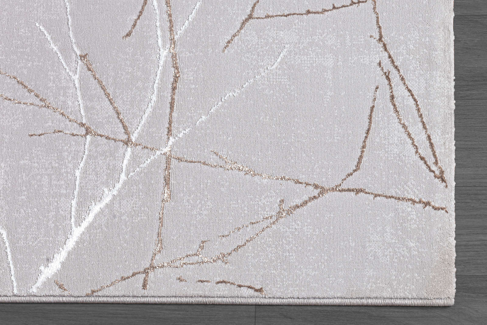             Bemusterter Hochflor Teppich in Grau – 150 x 80 cm
        