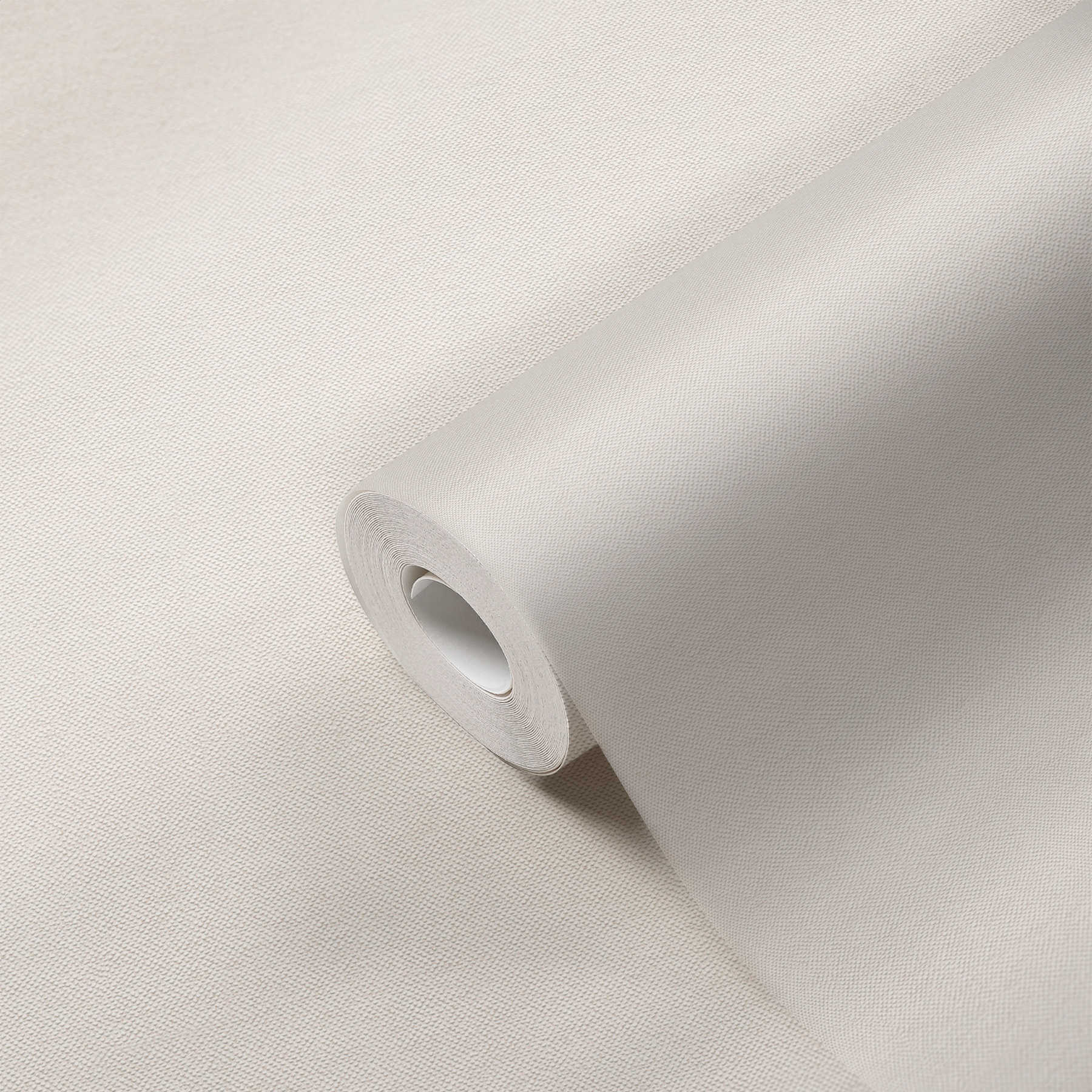             Uni Tapete Creme-Weiß mit Textil-Struktur
        
