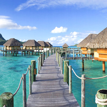         Exotische Fototapete Tahiti Bungalows im Wasser
    