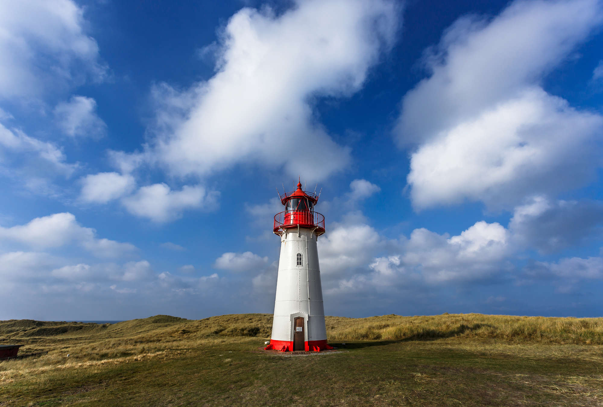             Fototapete Leuchtturm – Malerische Küstenlandschaft
        