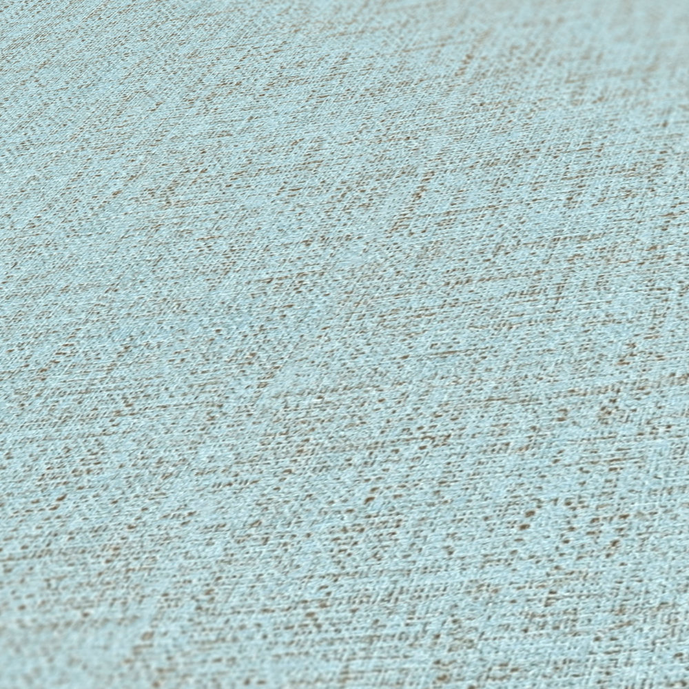             Blaue Tapete mit Textilstruktur & meliertem Effekt
        