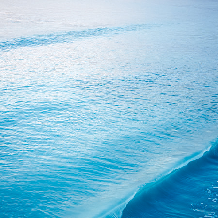         Fototapete einer brechenden Welle im Meer
    