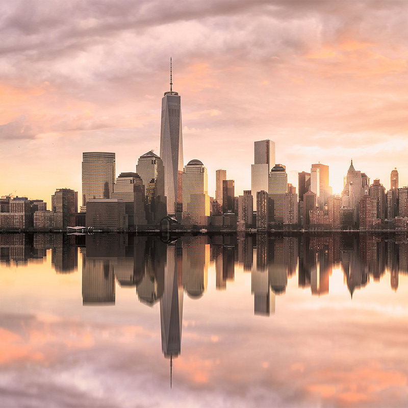             Fototapete New York Skyline am Abend – Grau, Orange, Gelb
        