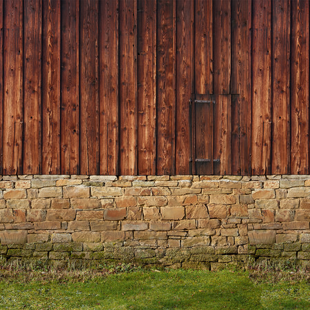 Fototapete mit Holzfassade und Natursteinmauer
