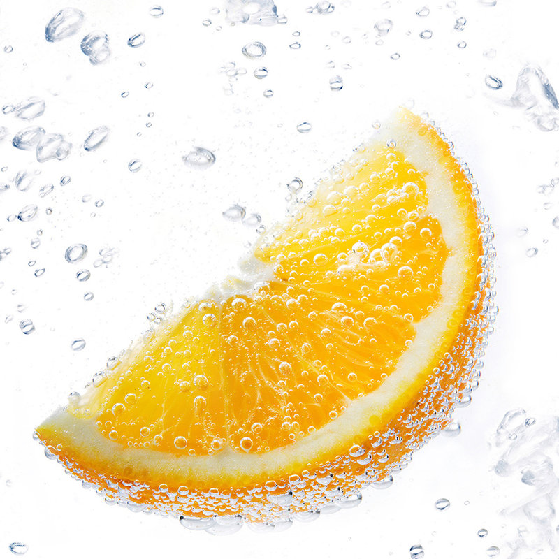Fototapete Orange in Sprudelwasser – Mattes Glattvlies

