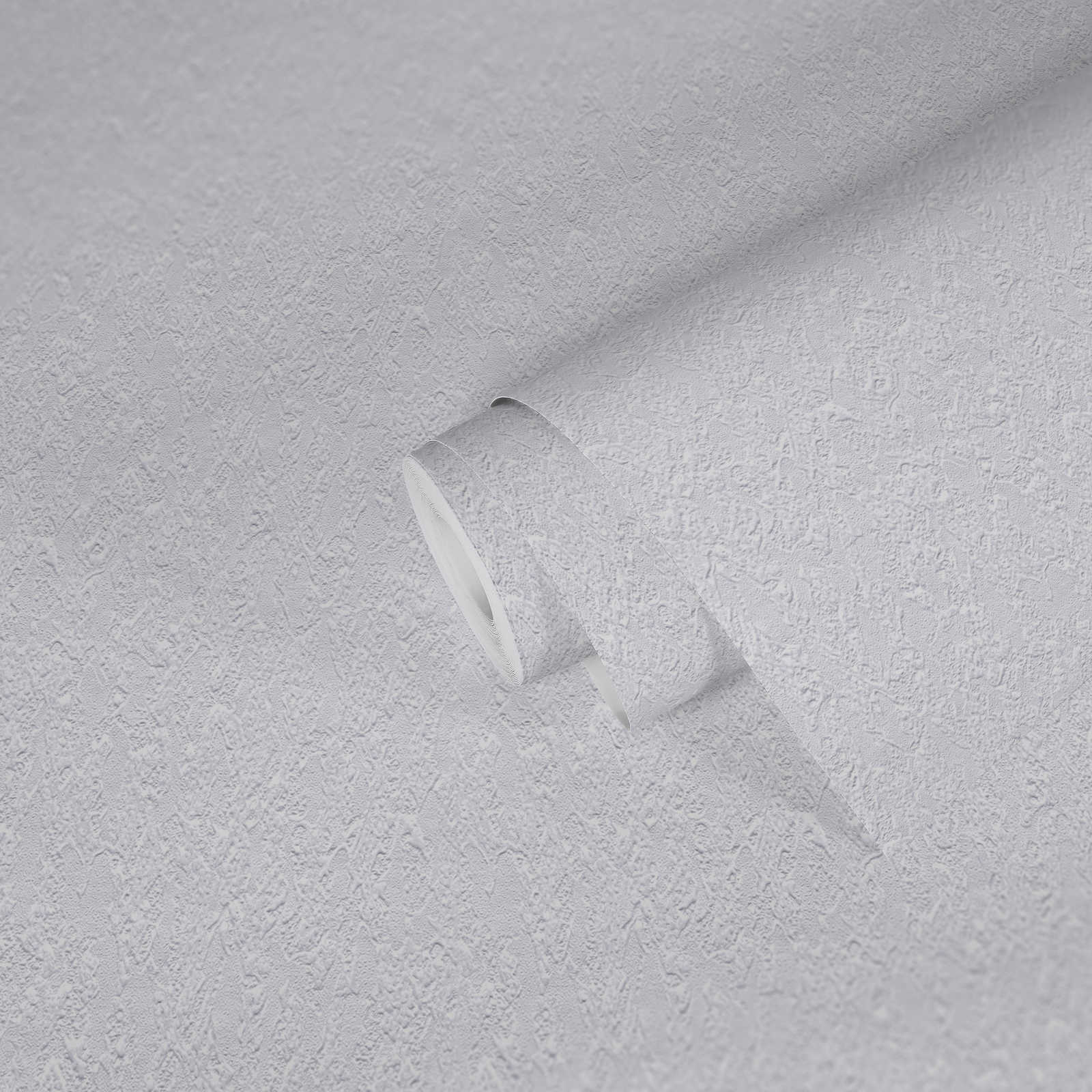             Weiße Papiertapete mit Struktureffekt in Putzoptik
        
