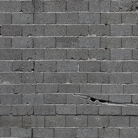 Fototapete graue Steinmauer mit Betonbausteinen
