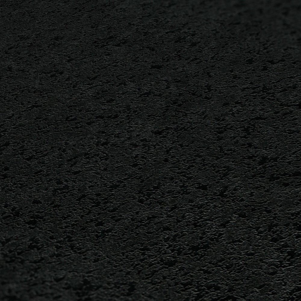             Schwarze Vliestapete einfarbig mit Texturmuster
        