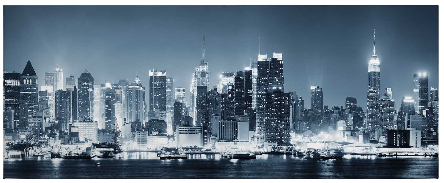             Panorama Leinwandbild New Yorker Skyline bei Nacht – 1,00 m x 0,40 m
        
