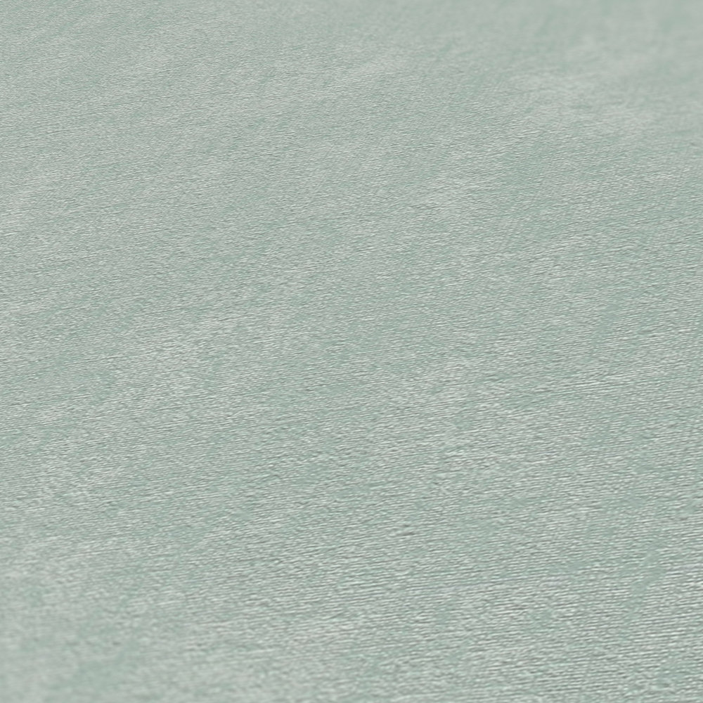             Leicht strukturierte Vliestapete in Textiloptik – Mint
        