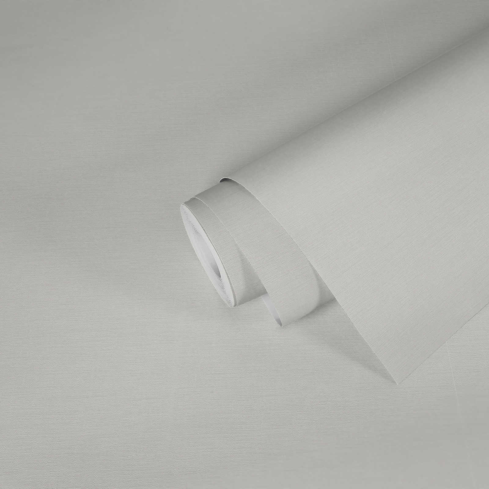             Unitapete in Pastellfarbe mit dezenter Textilstruktur – Weiß
        