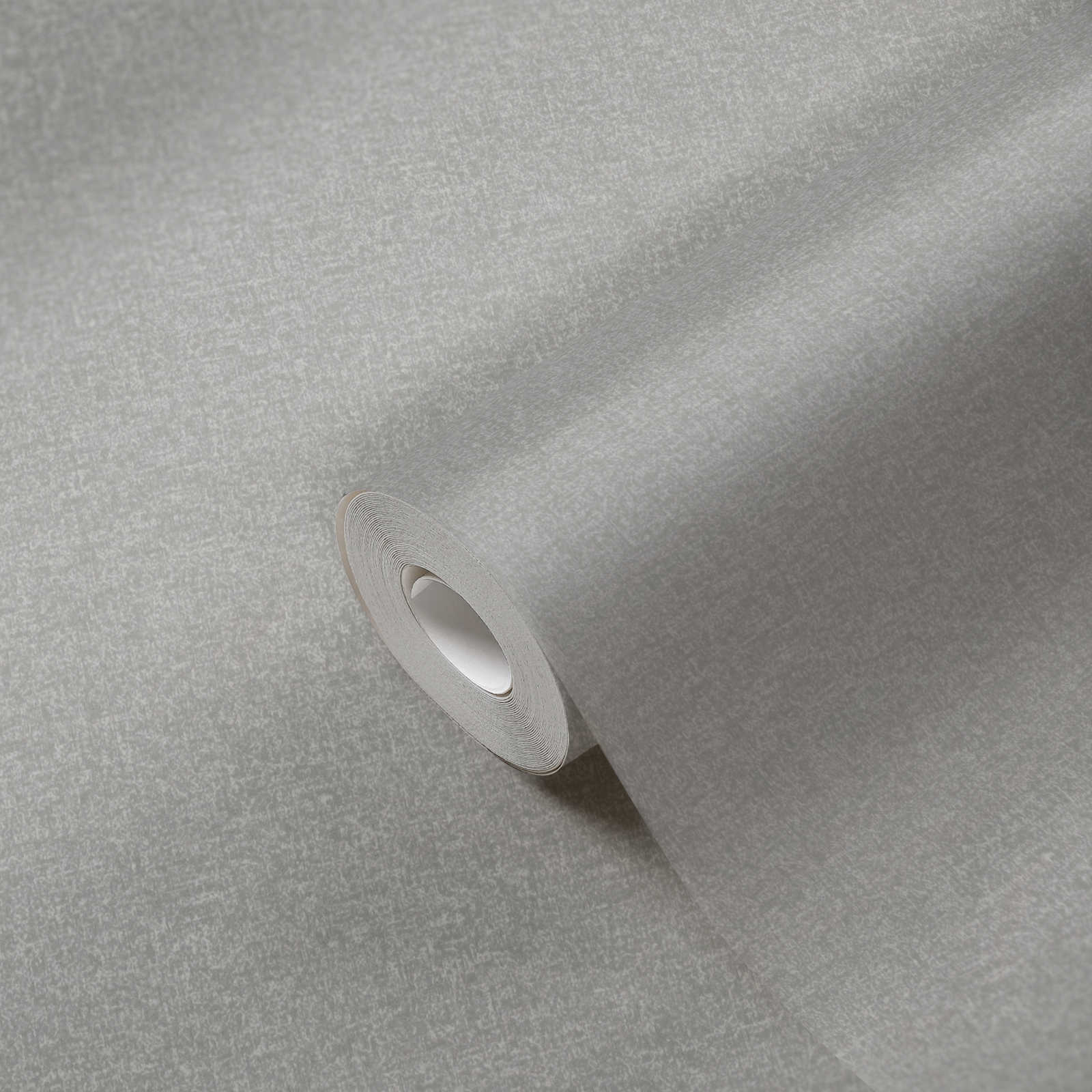             Vliestapete einfarbig mit leichten Strukturmuster – Grau
        