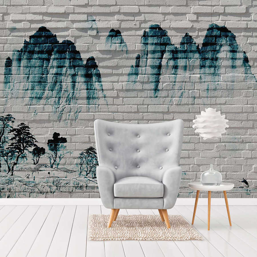 Fototapete Berge auf Backsteinmauer – Blau, Weiß
