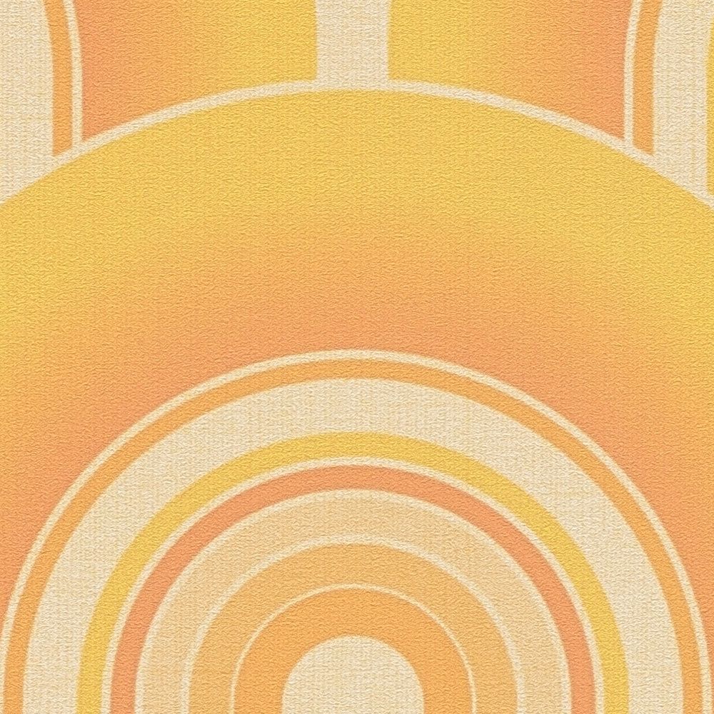             70er Tapete mit grafischem Retro Design – Gelb, Orange
        