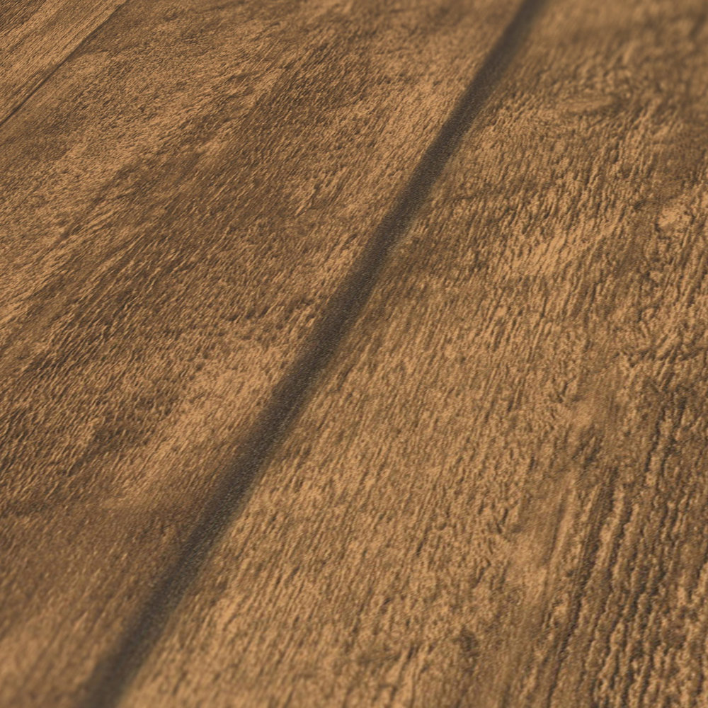             Holzoptik Vliestapete mit rustikaler Maserung – Braun
        